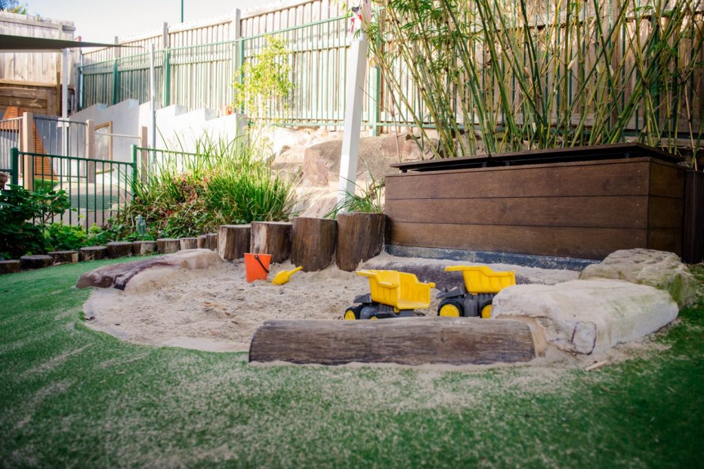 Sand pit - ready to play and interact with other children - Kinder Cottage Qld